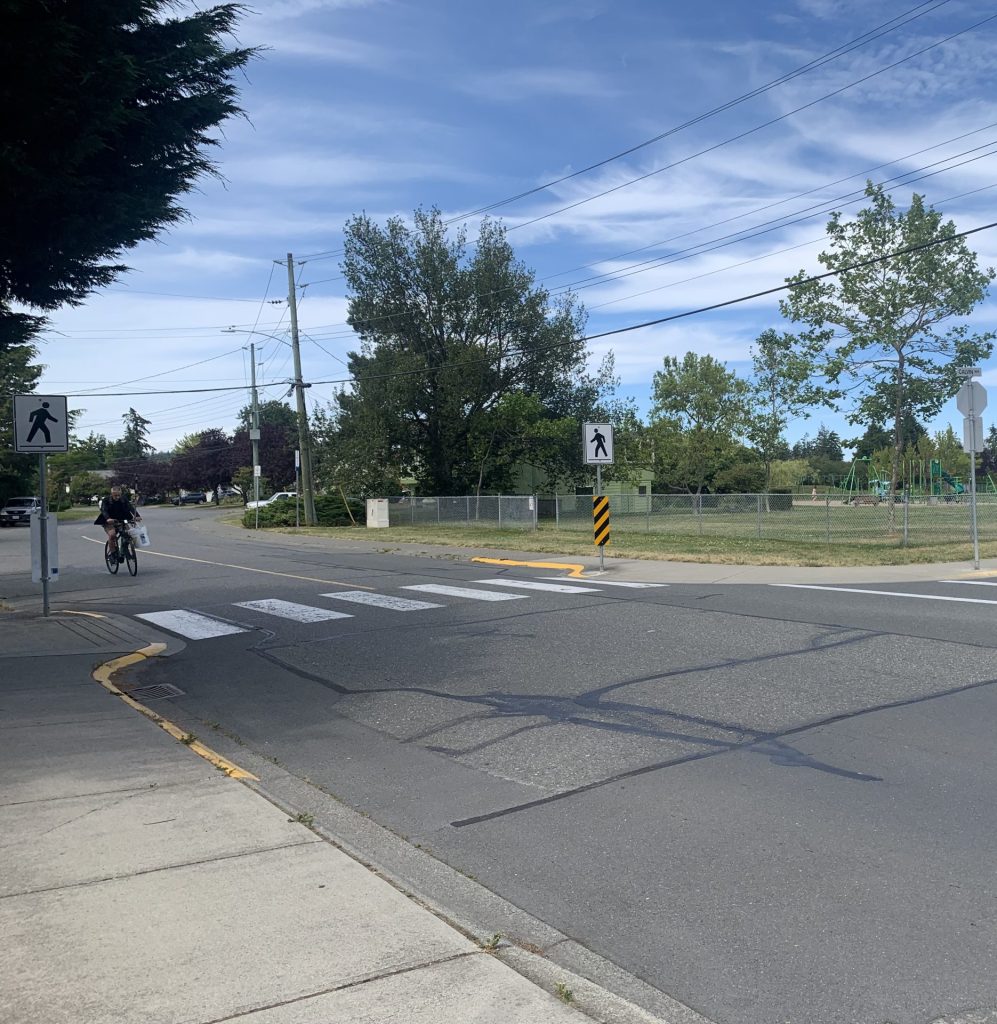 Pedestrian crossing and cyclist at Calvin Avenue and Bowerbank Road